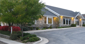 visual of a house with grey roof